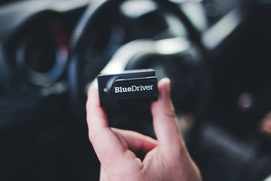 Close-up of a handheld automotive diagnostic scanner